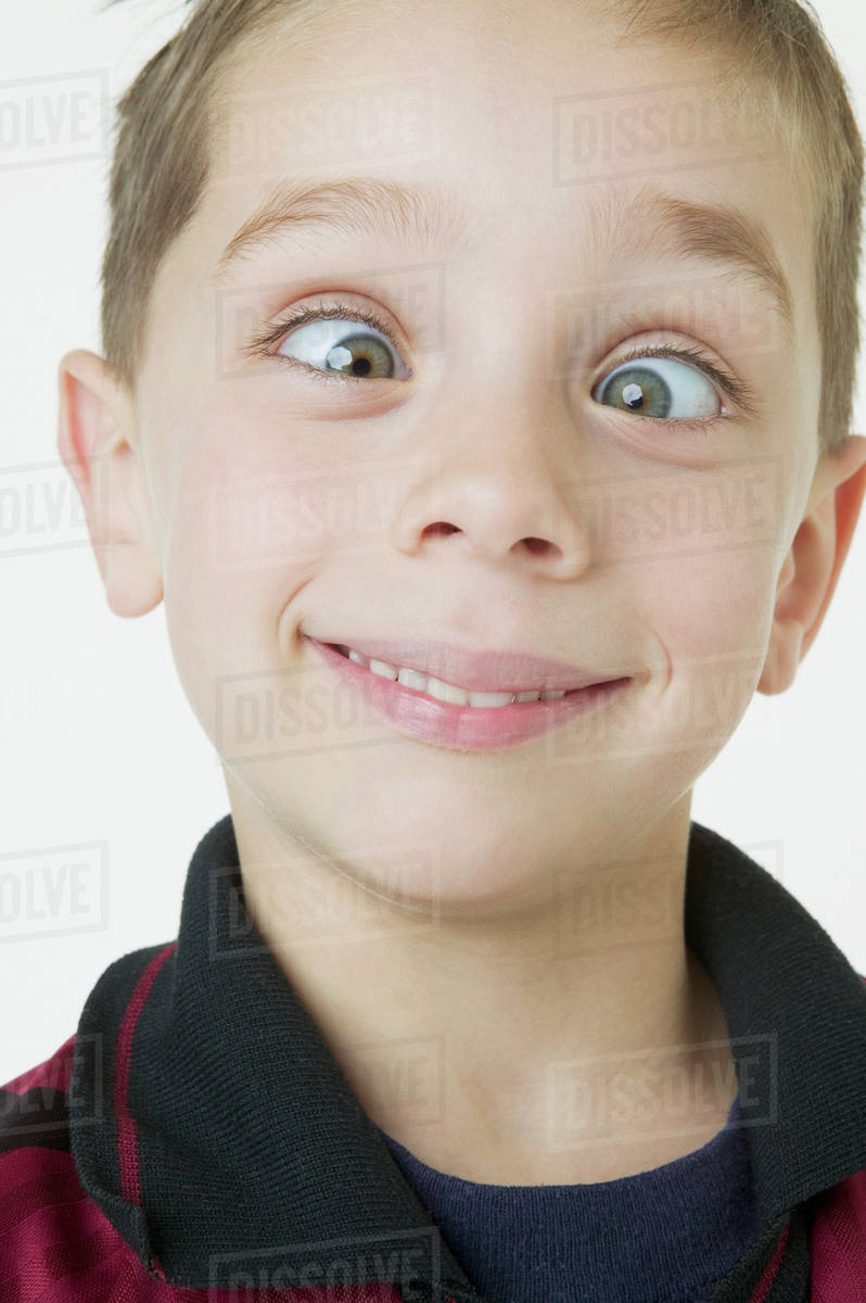 Close up of boy crossing eyes Stock Photo Dissolve