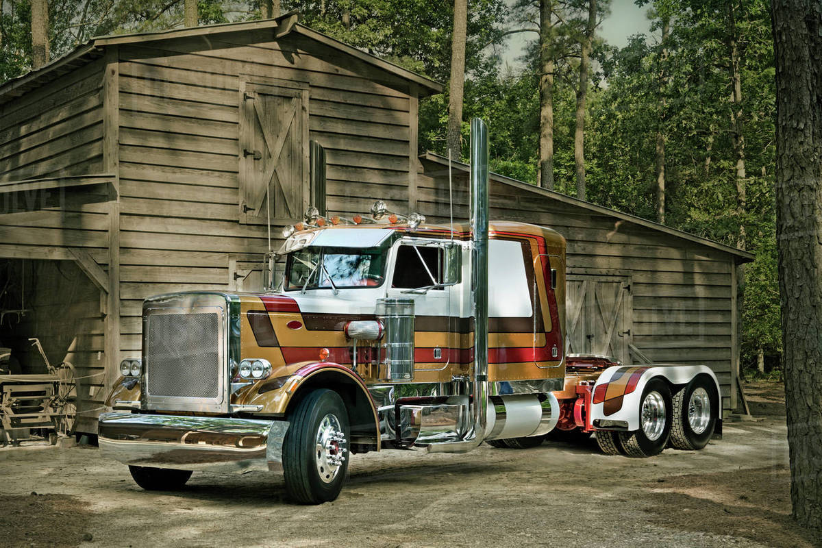 Semitruck at barn Stock Photo Dissolve