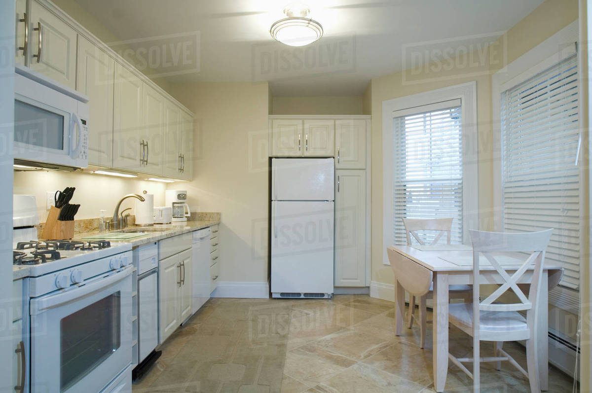 Light colored traditional kitchen Stock Photo Dissolve