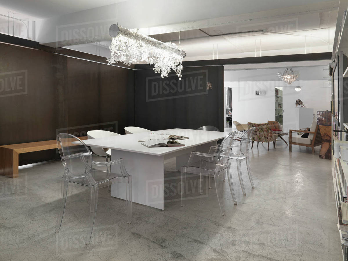 Modern Dining Room With Clear Chairs Stock Photo Dissolve