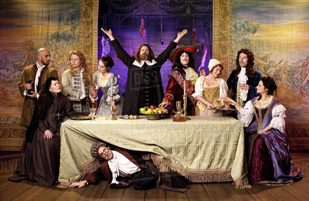 Actors in oldfashioned costumes on stage Stock Photo Dissolve