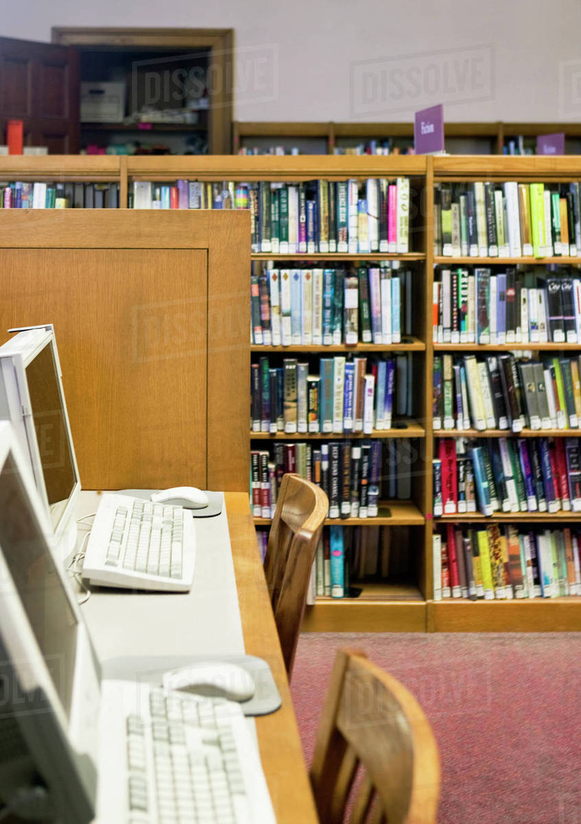 Computer Workstations in Library - Stock Photo - Dissolve