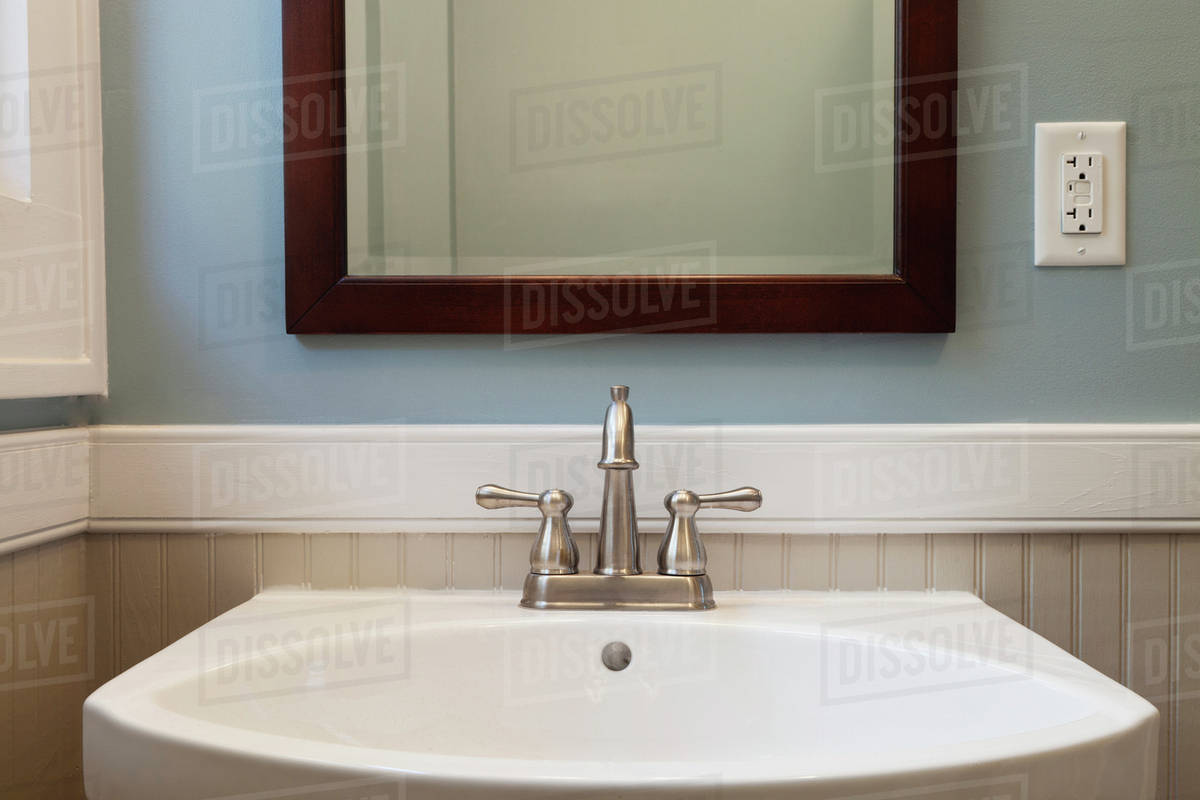 Sink and mirror in bathroom - Royalty-free Stock Photo | Dissolve