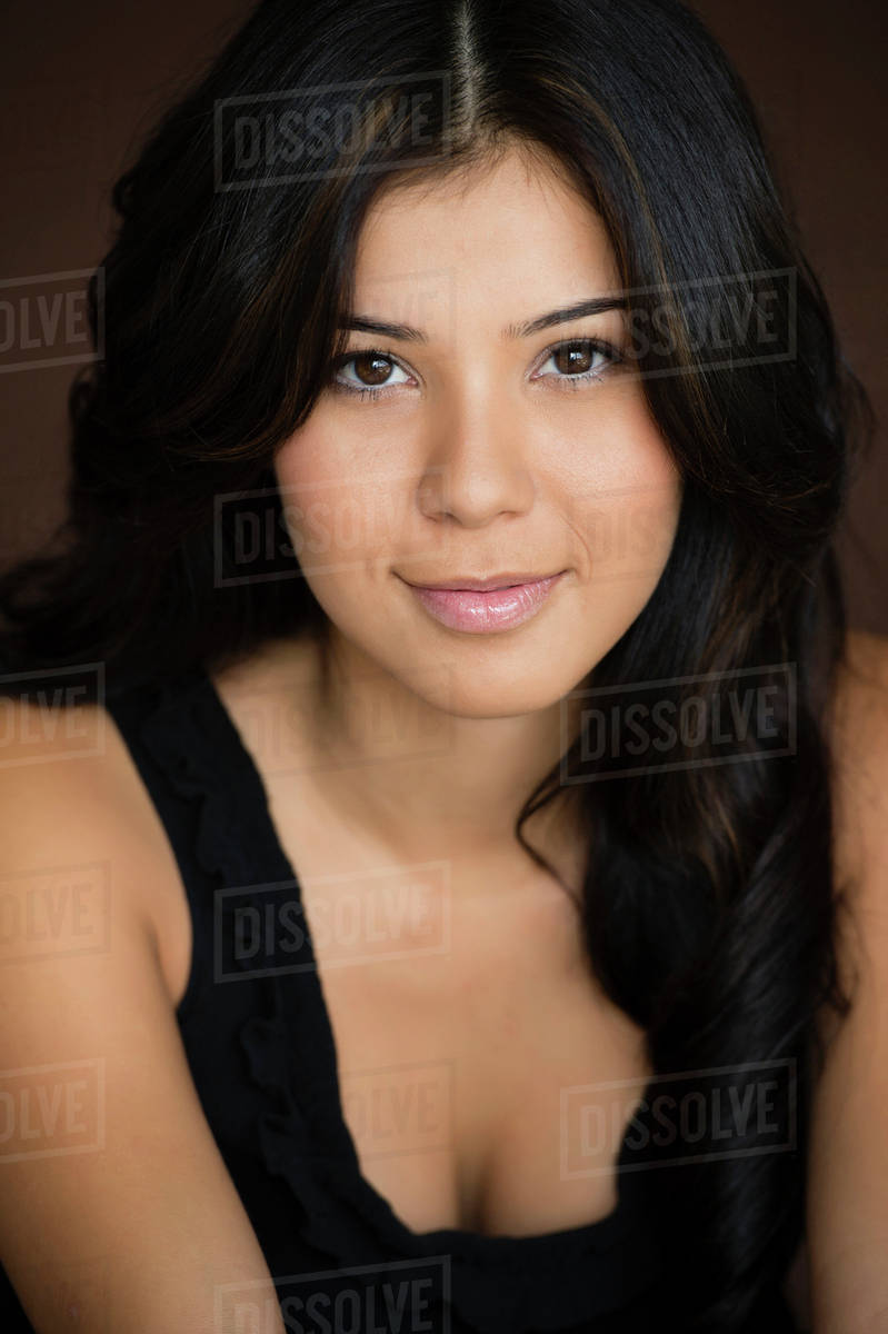 Smiling Hispanic woman Stock Photo Dissolve