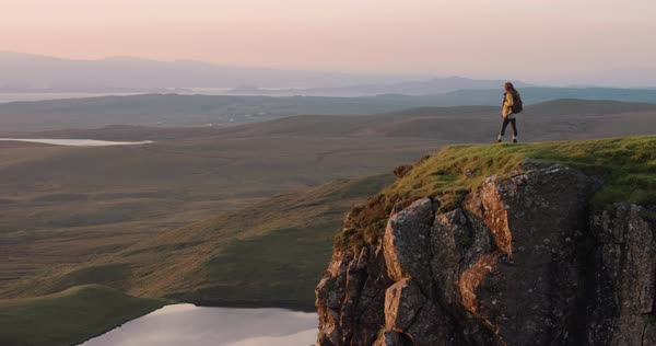 Womanler Standing At Edge Of Cliff Looking Sunrise Sky Hiker Relaxing In Scenic Landscape Enjoying Womanler Standing At Edge Of Cliff Looking Sunrise Sky Hiker Relaxing In Scenic Landscape Enjoying