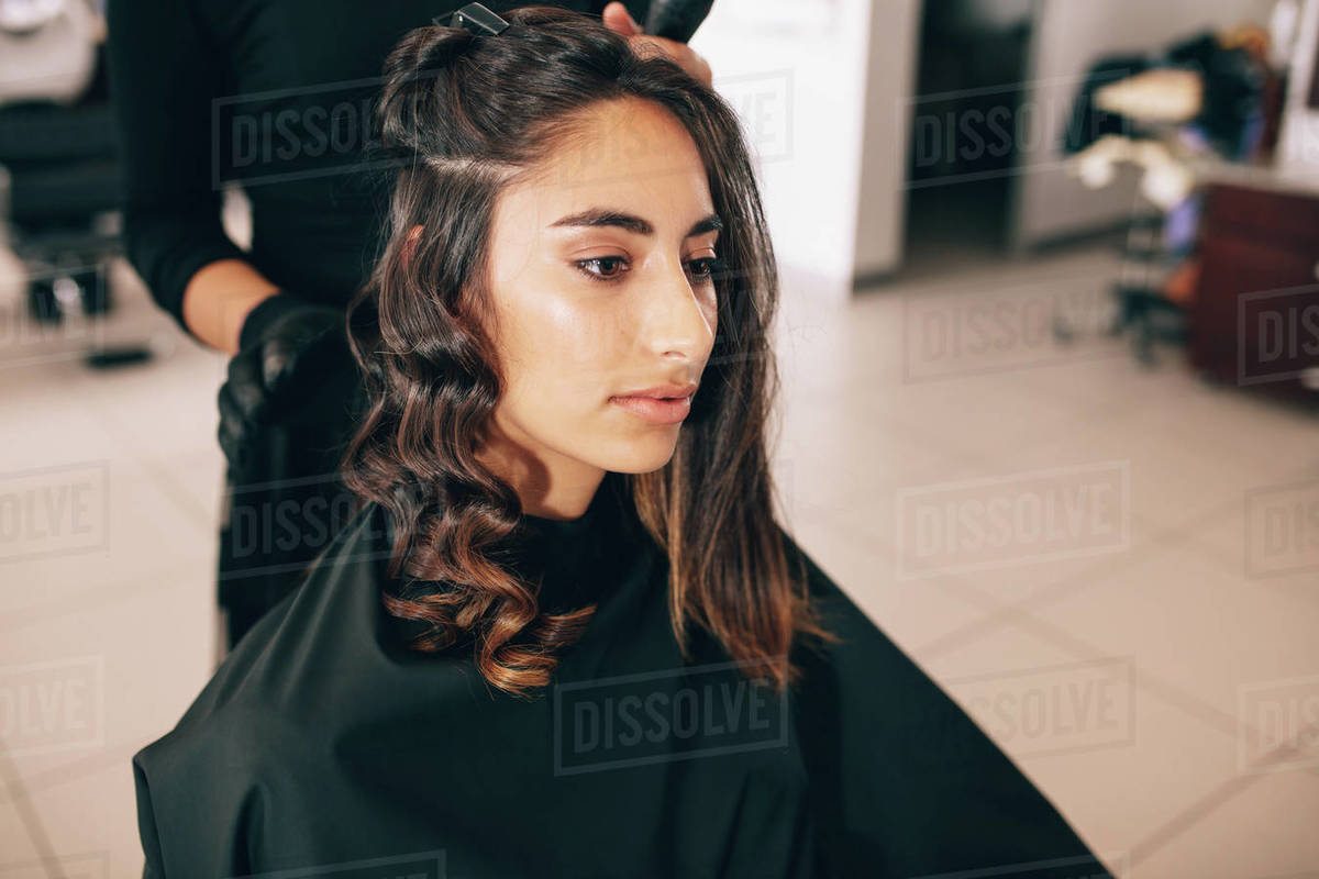 Close Up Of Young Woman At The Salon Getting Her Hair Styled Hair