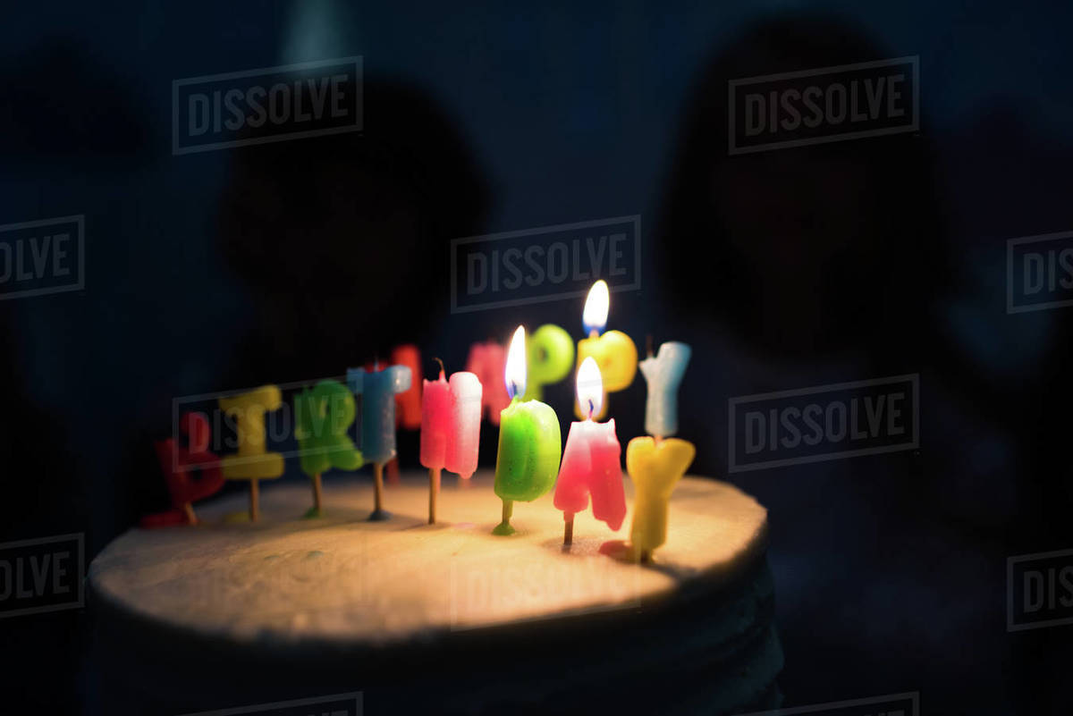 Close Up View Of Delicious Birthday Cake With Burning Candles In