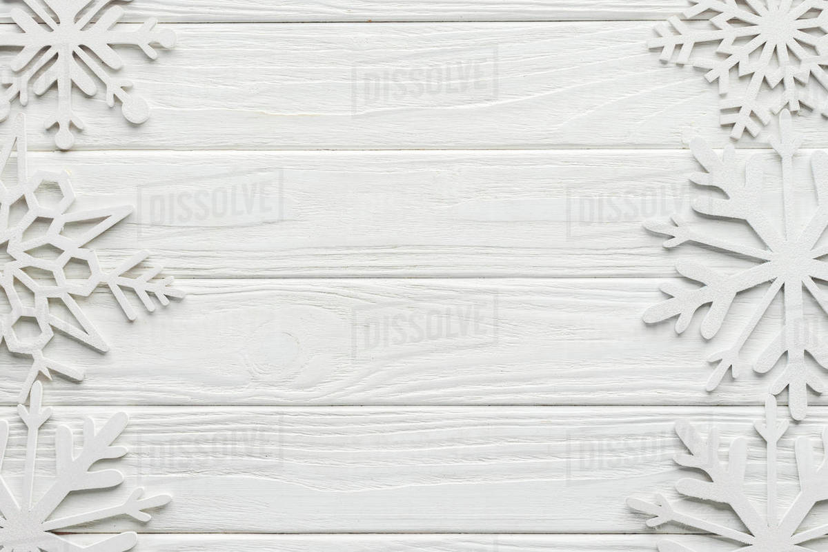 Flat Lay With Decorative Snowflakes On White Wooden Tabletop D2115 154 273 Flat Lay With Decorative Snowflakes On White Wooden Tabletop D2115 154 273