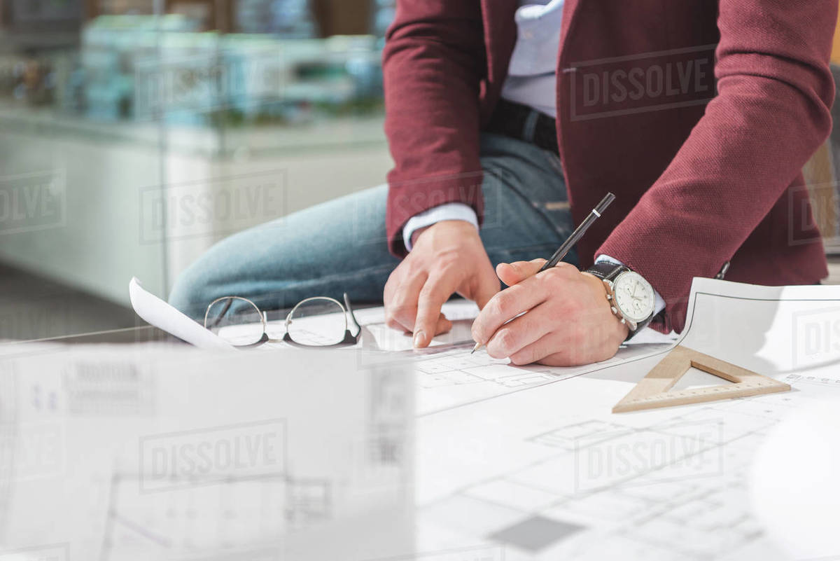 Cropped shot of architect drawing building plan Royalty-free stock photo