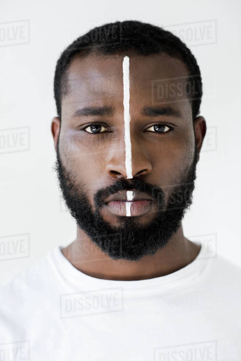 Portrait Of Handsome African American Man With White Stripe On