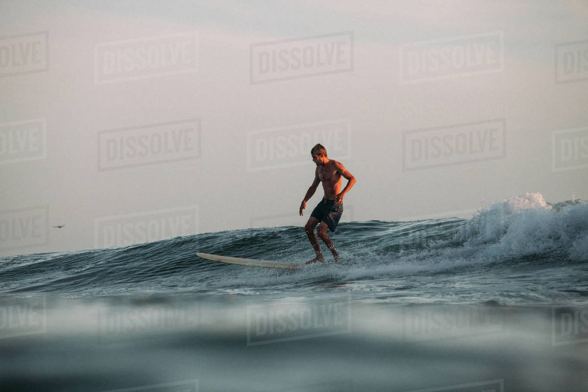 Surfer on a longboard, San diego, california, america, USA Stock