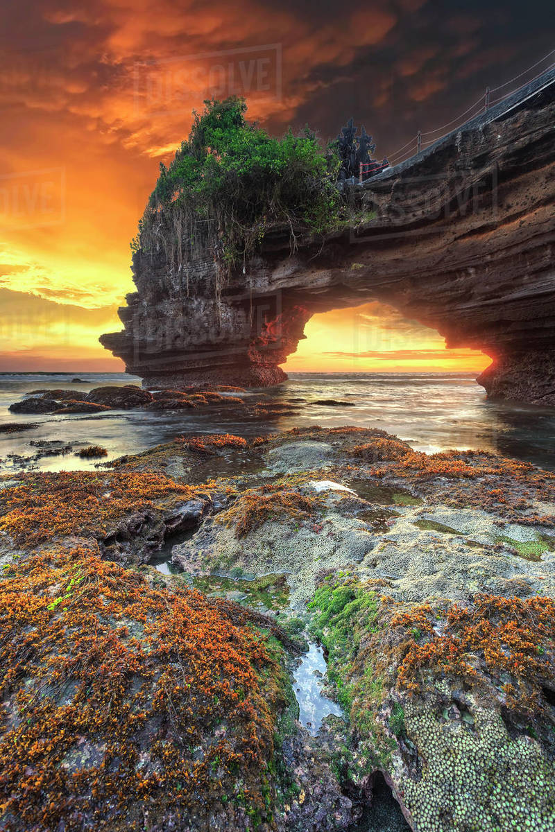 Tanah Lot temple and Batu Bolong beach at sunset, Bali, Indonesia