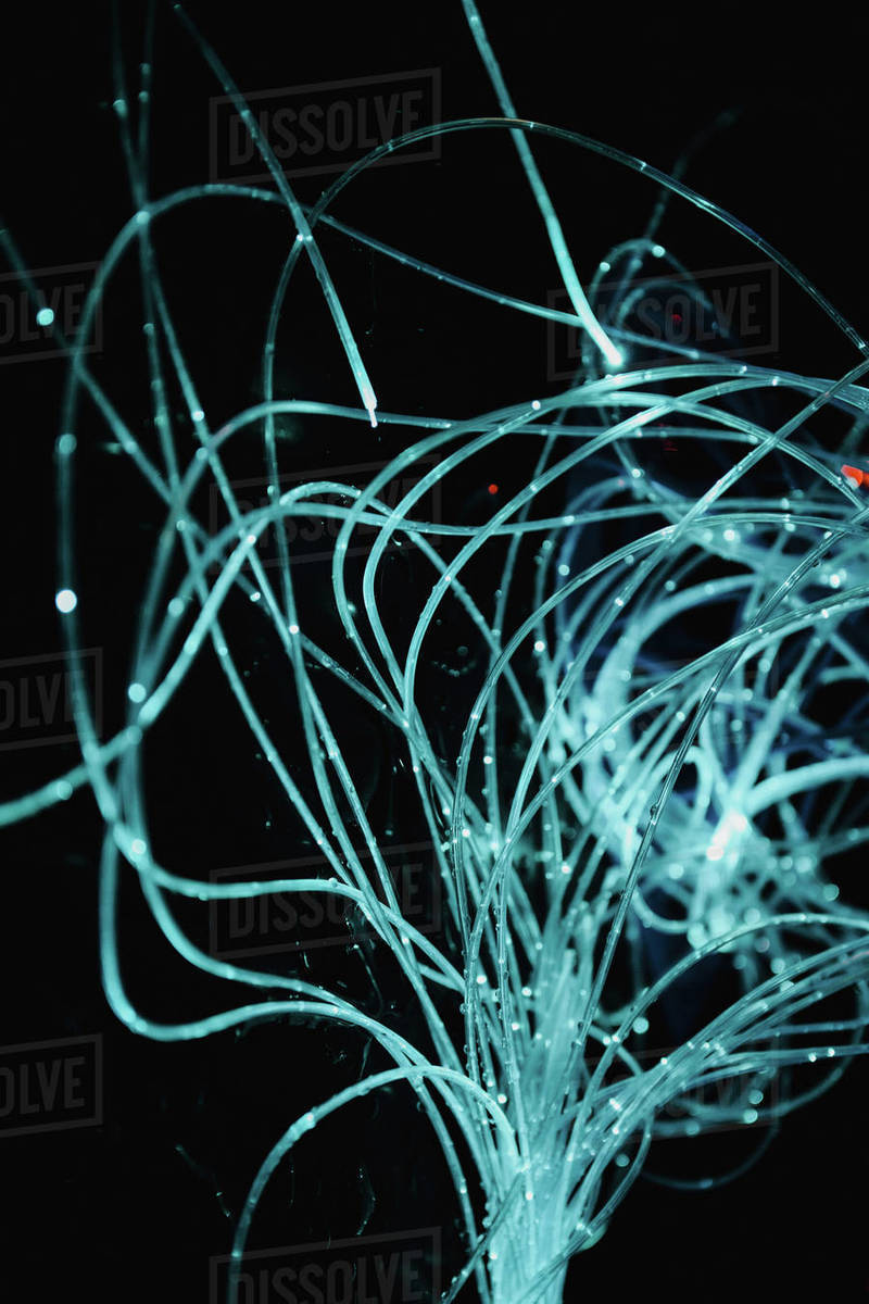 Closeup of abstract blue translucent thin wire with illumination inside ...