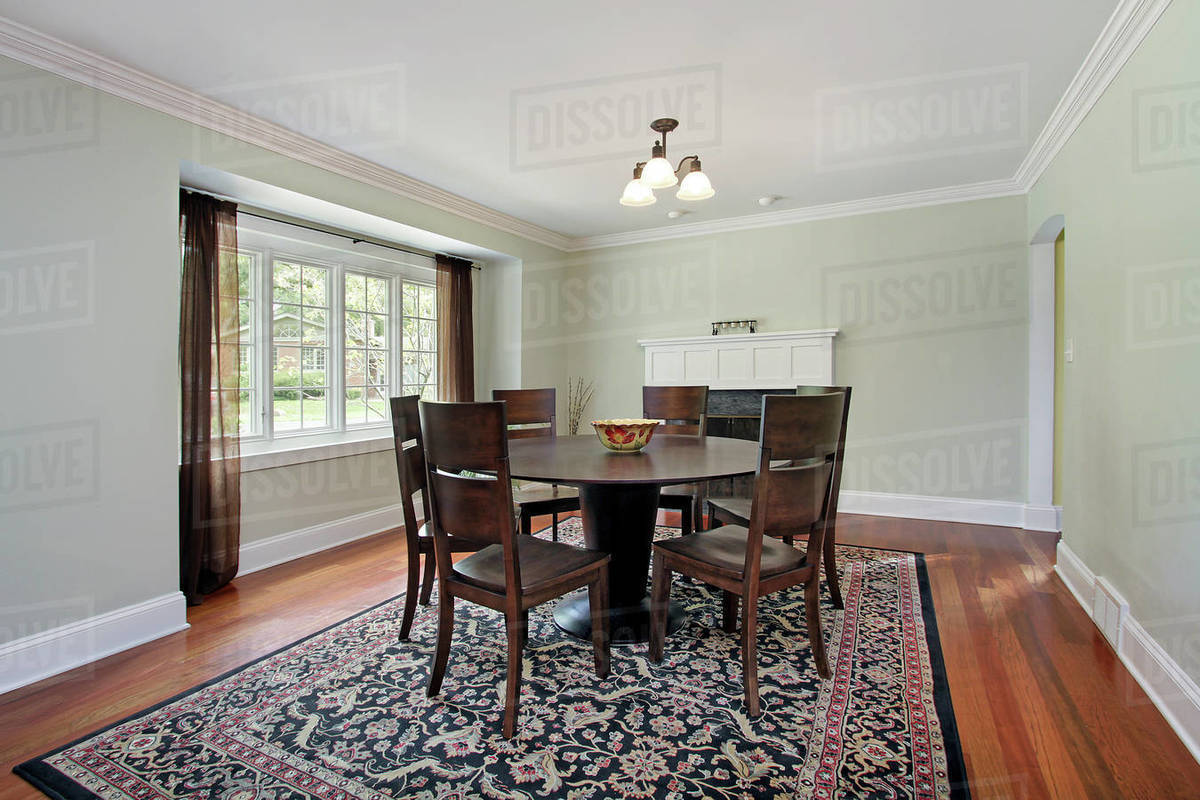 Dining room in new construction home with lime green walls Stock