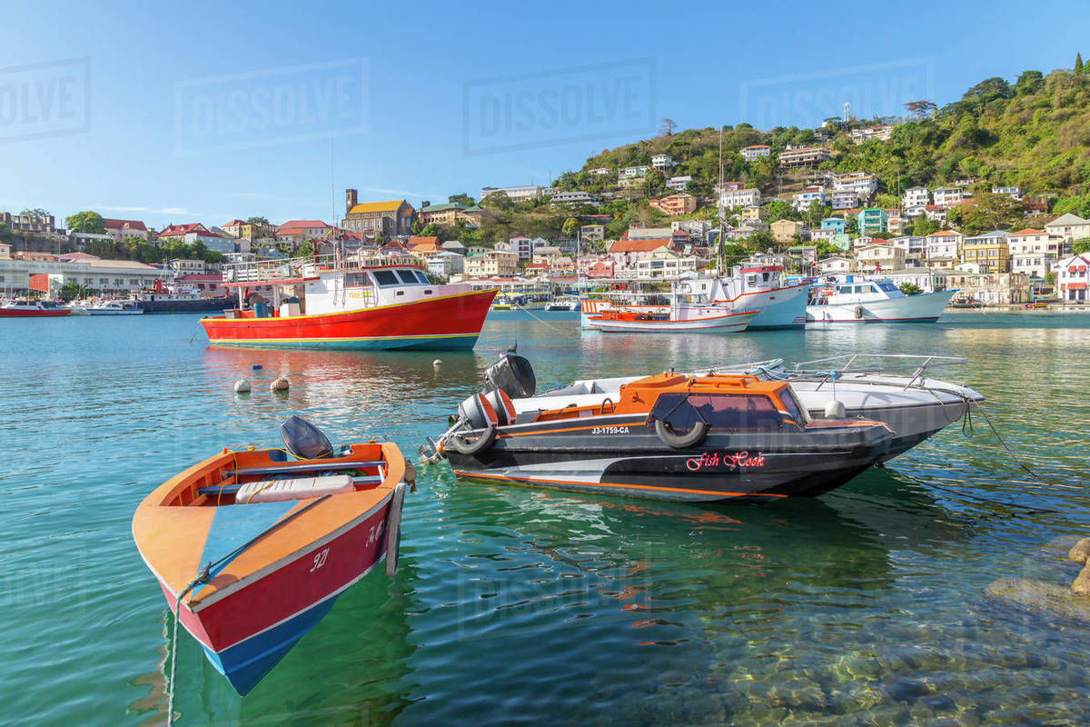 Colourful boats and houses on the Carenage of St. George's, Grenada, Windward Islands, West Indies, Caribbean, Central America Royalty-free stock photo