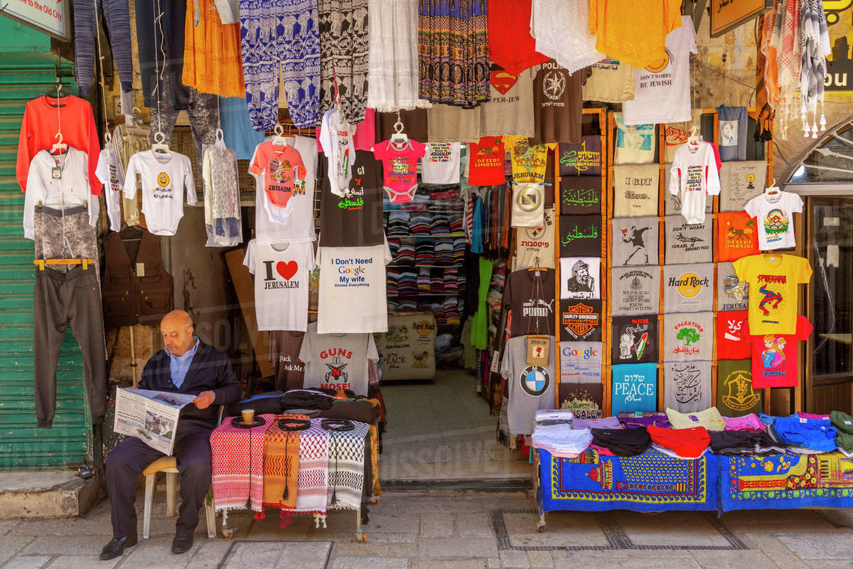 Colourful clothes, Souk Khan al-Zeit Street in Old City, Old City, UNESCO World Heritage Site, Jerusalem, Israel, Middle East Royalty-free stock photo