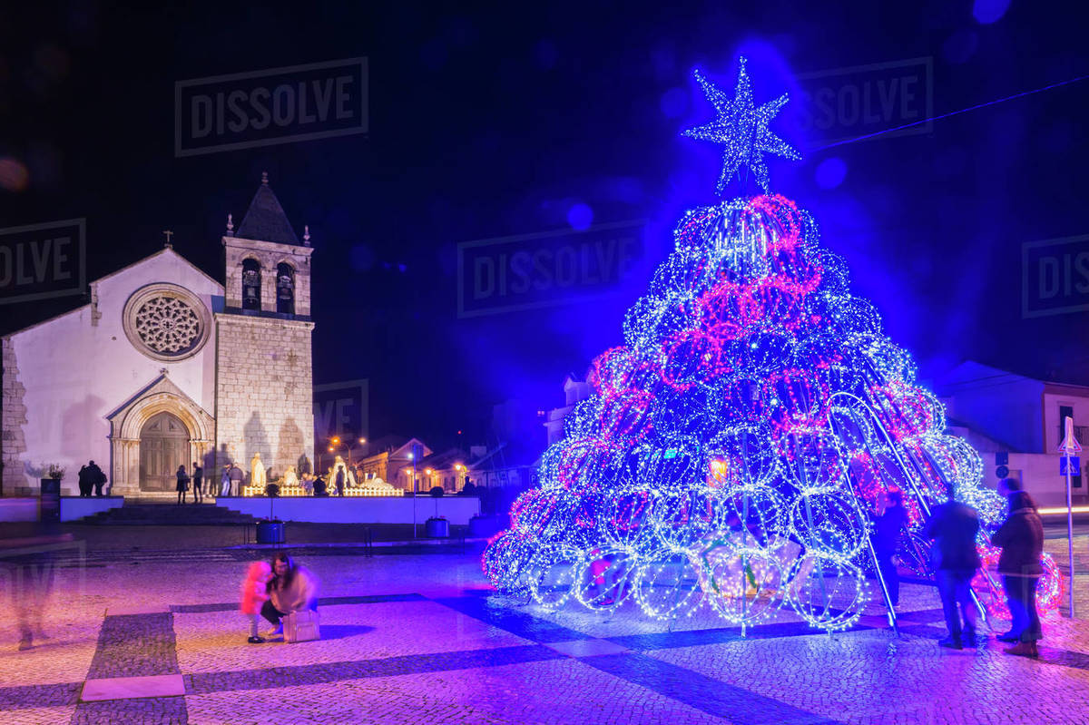 Illuminated modern Christmas tree in front of the Parish Church, Alcochete, Setubal Province, Portugal, Europe Royalty-free stock photo