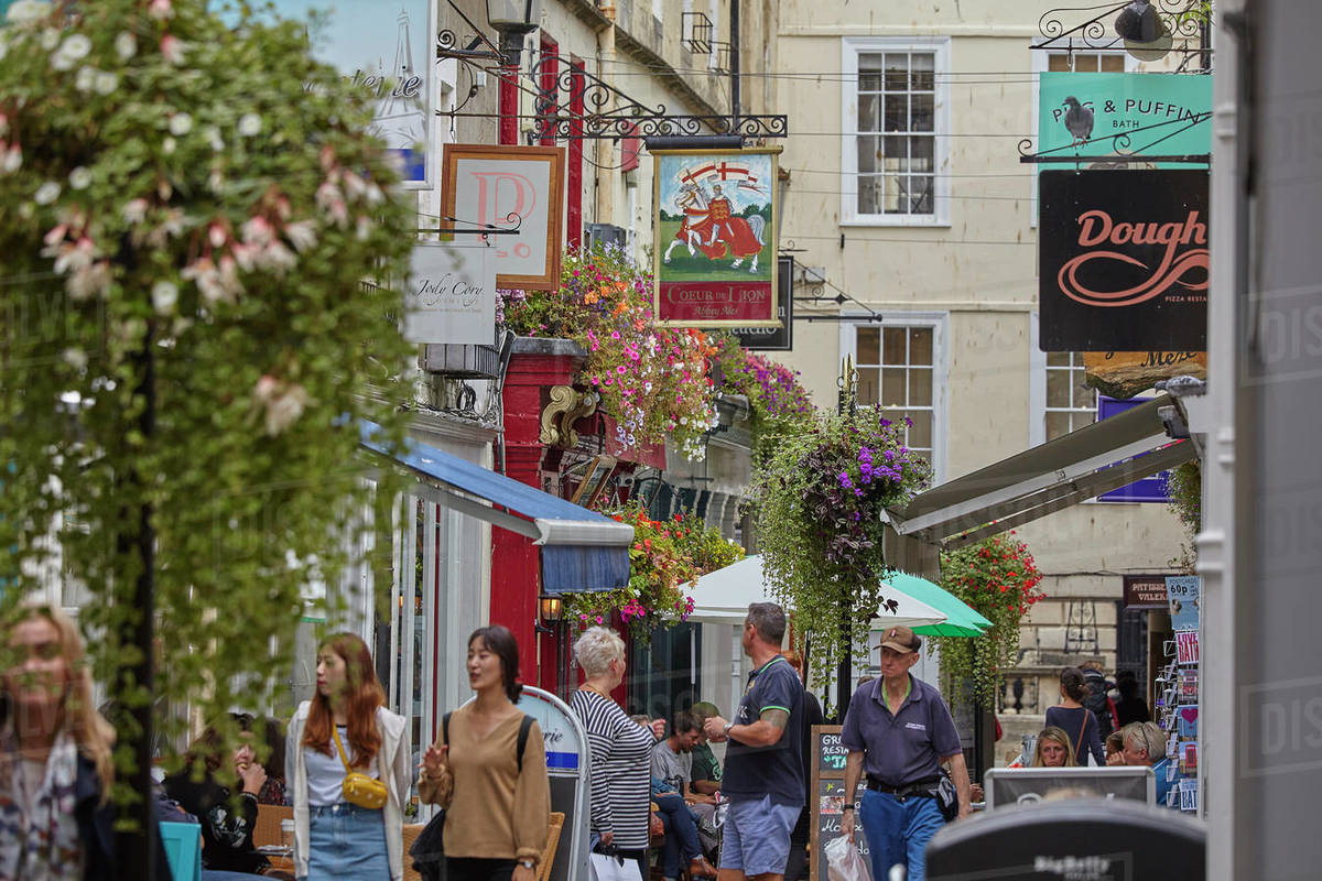 Historic architecture and a street scene in the historic heart of Bath, Somerset, England, United Kingdom, Europe Royalty-free stock photo