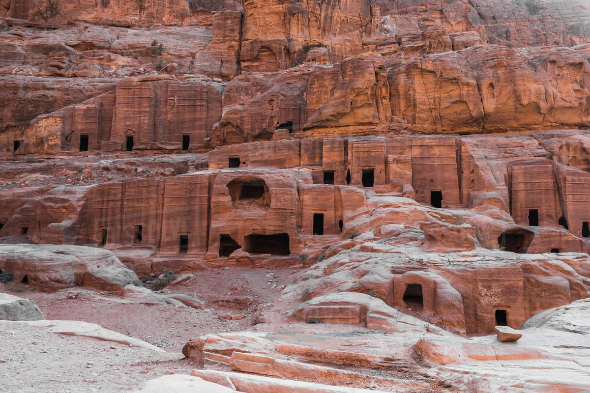 Caves carved in the stone of the mountain inside, Petra, UNESCO