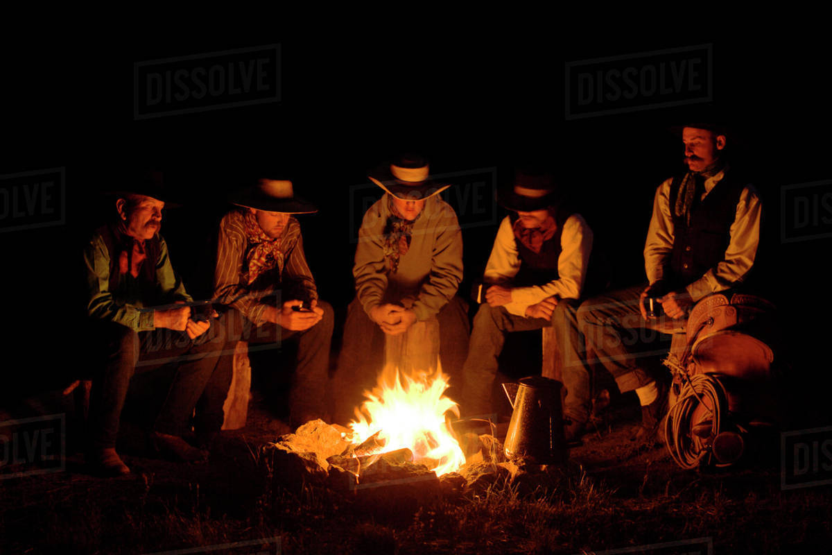 usa oregon seneca ponderosa ranch five cowboys sitting around a