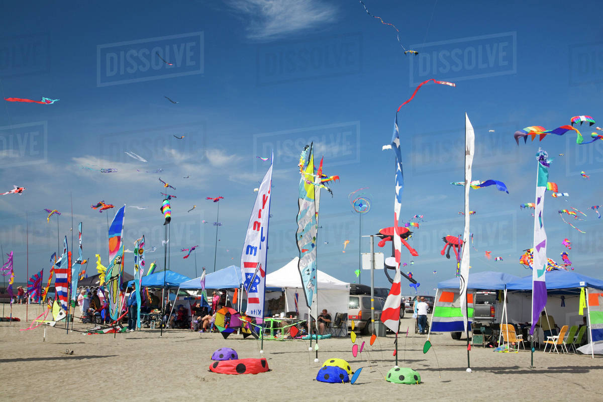 WA, Long Beach, International Kite Festival, colorful banners Stock Photo Dissolve