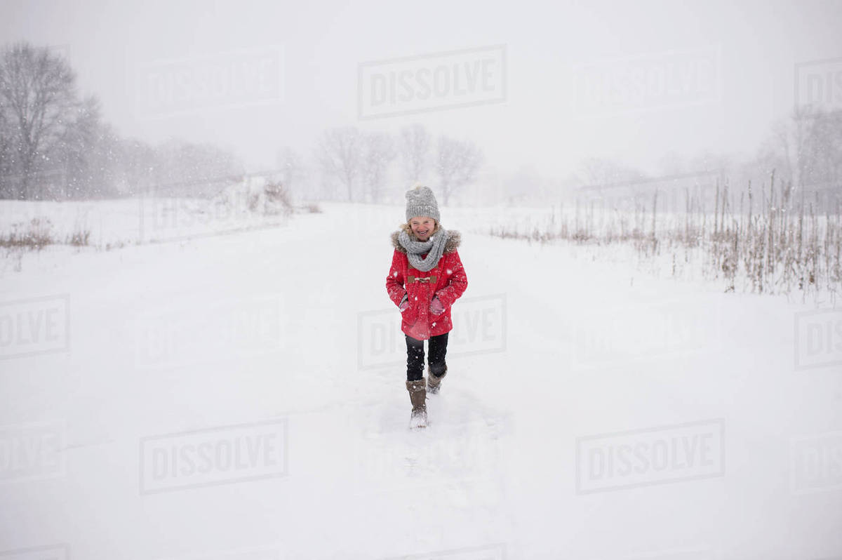 girl walking in snow