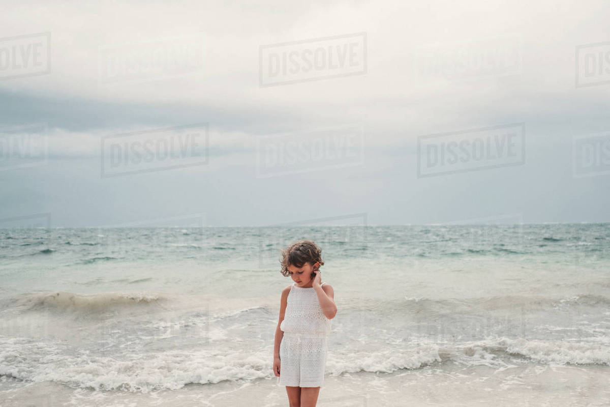 Girl on beach, Cancun, Mexico - Stock Photo - Dissolve