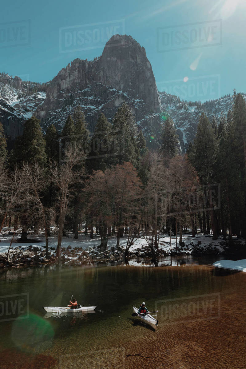 Friends kayaking in lake, Yosemite Village, California, United States