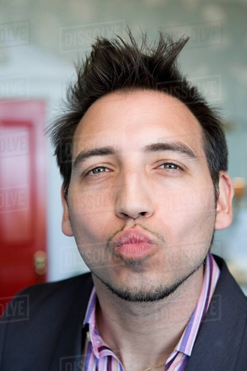 Man blowing a kiss Stock Photo Dissolve