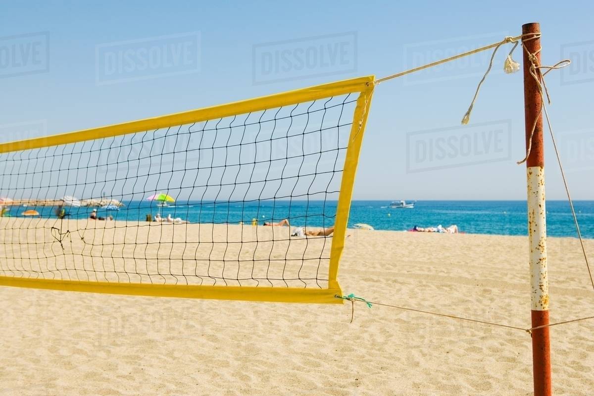 Volleyball net on beach Stock Photo Dissolve