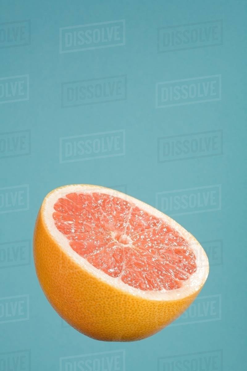 Half a grapefruit Stock Photo Dissolve