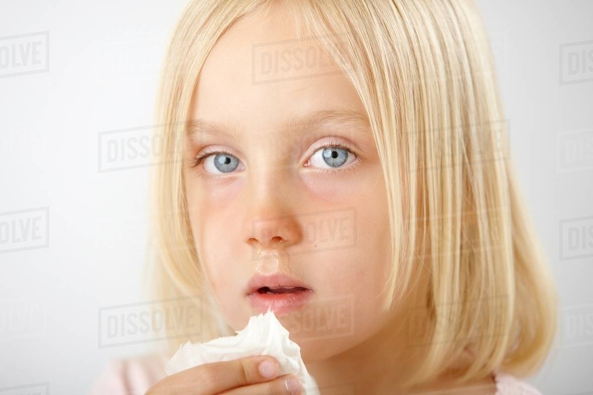 Girl with runny nose Stock Photo Dissolve