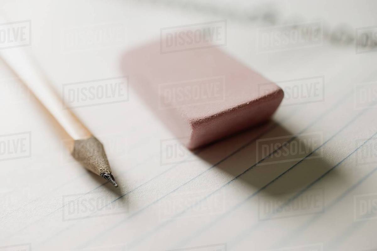 Pencil eraser and notebook Stock Photo Dissolve