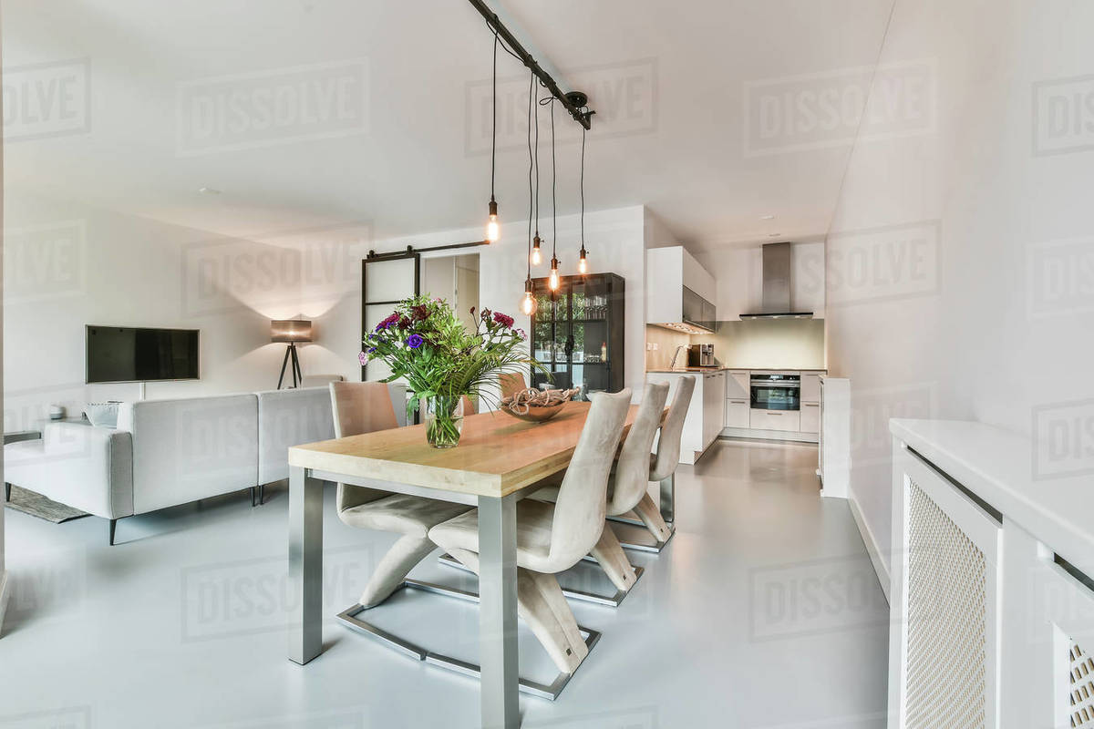 Stylish dining room with decorative table and chairs Stock Photo Dissolve