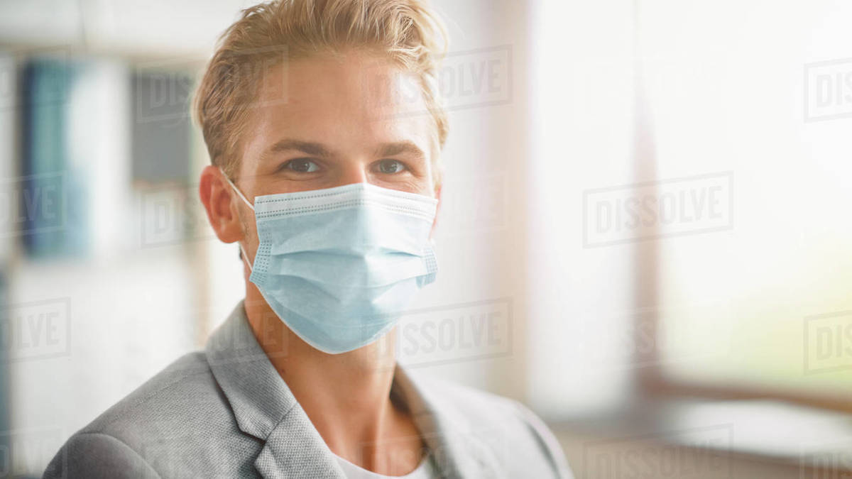 Man wearing face mask Stock Photo Dissolve