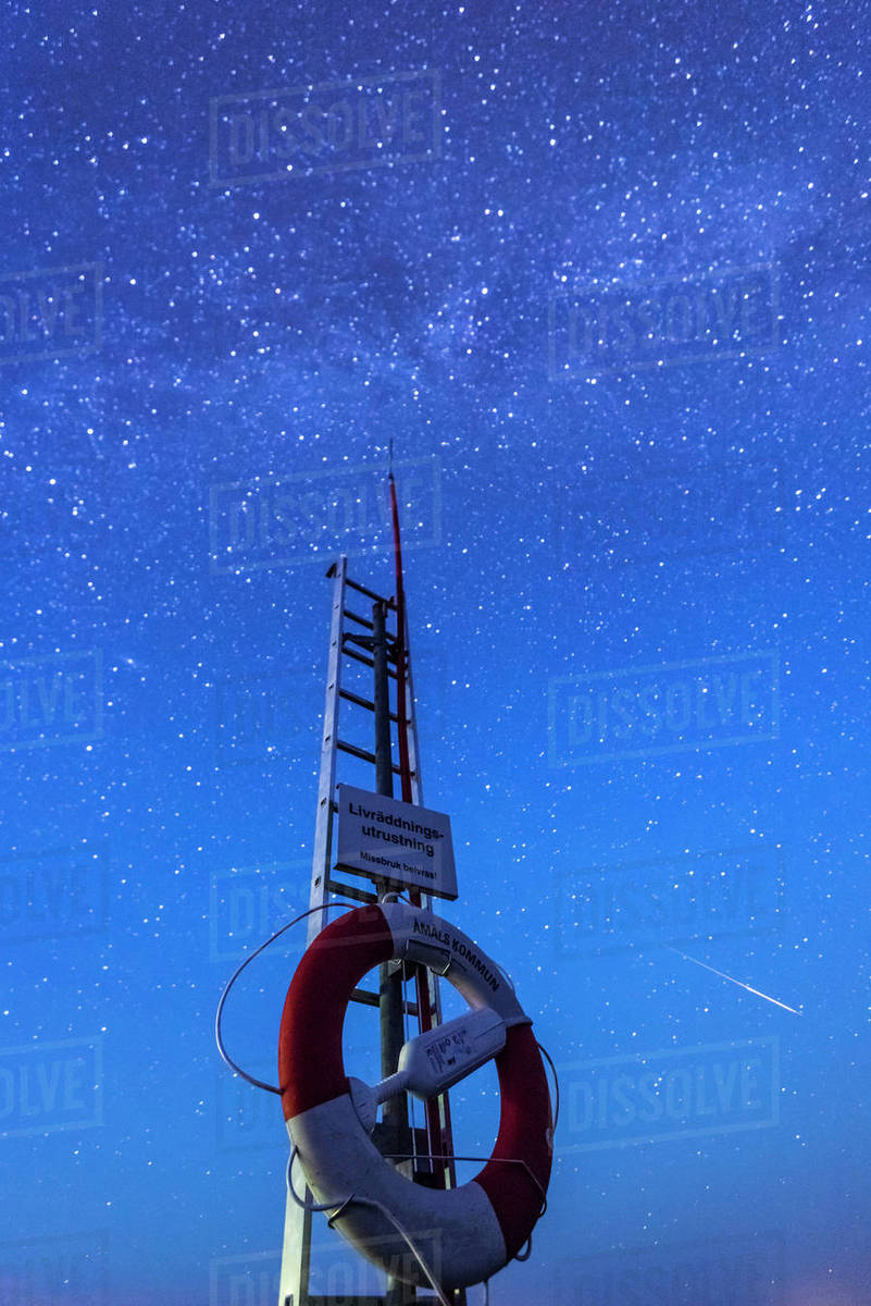 Light belt against starry sky Stock Photo Dissolve