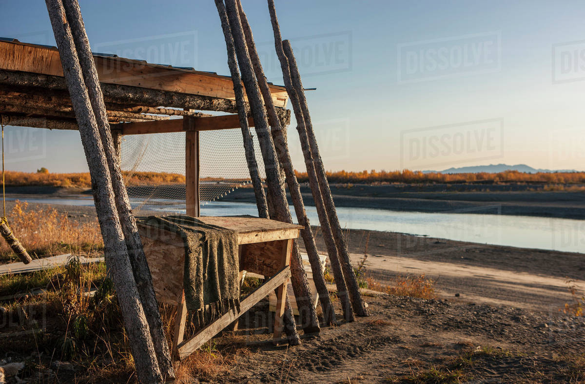 Wooden fish drying rack on the bank of the Noatak River; Noatak, Alaska