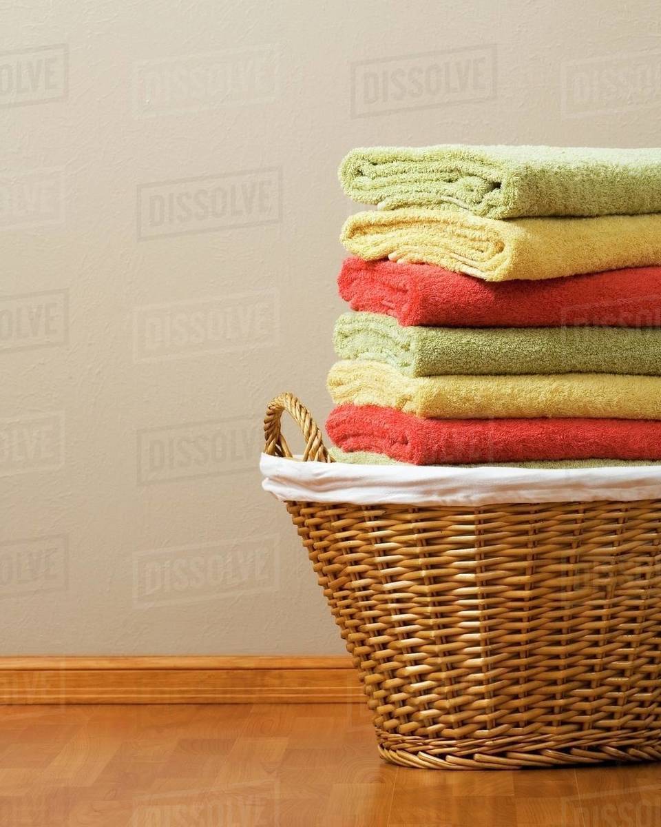 Laundry Basket With Folded Towels Stock Photo Dissolve