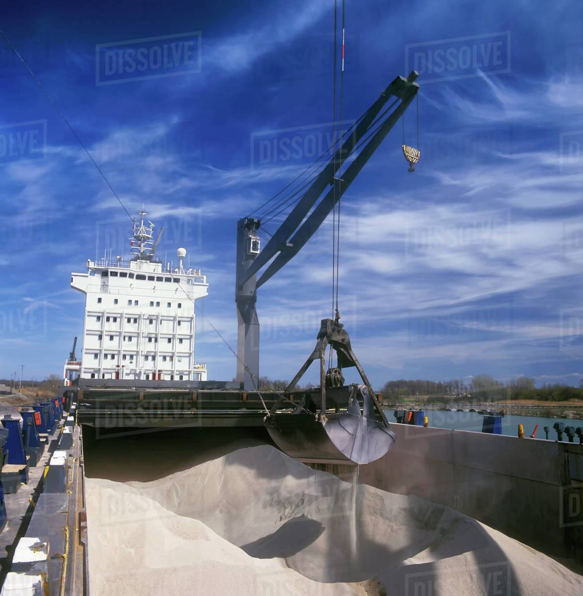 Agriculture Potash being unloaded from the hold of a ship. Potash is