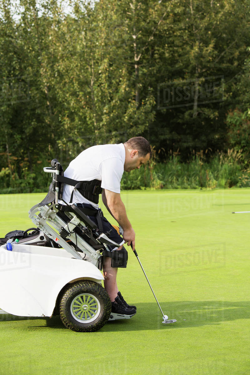 Disabled golfer in a tournament using high tech mobility aid; Edmonton