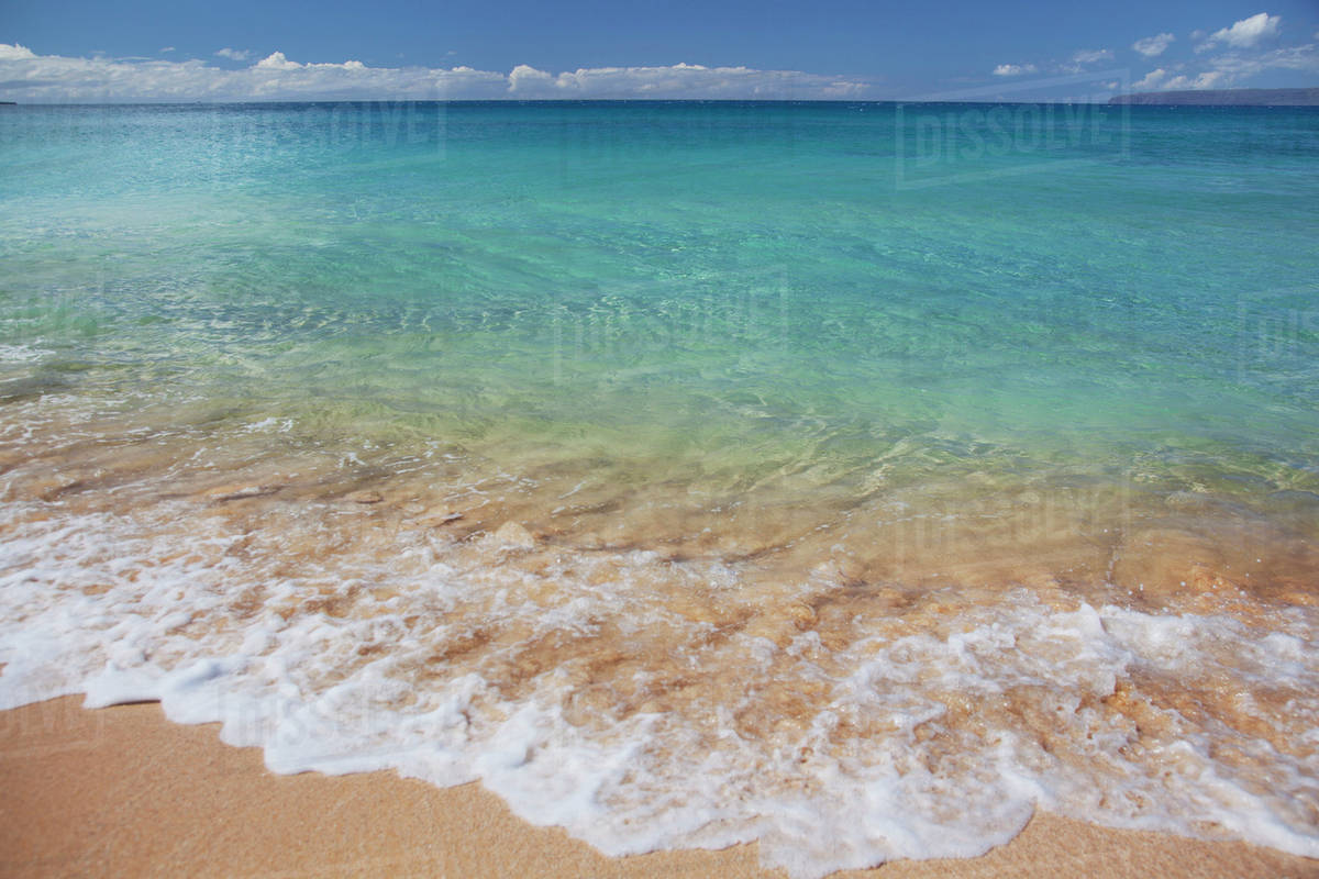 Clear blue water at Makena's Big Beach; Maui, Hawaii, United States of