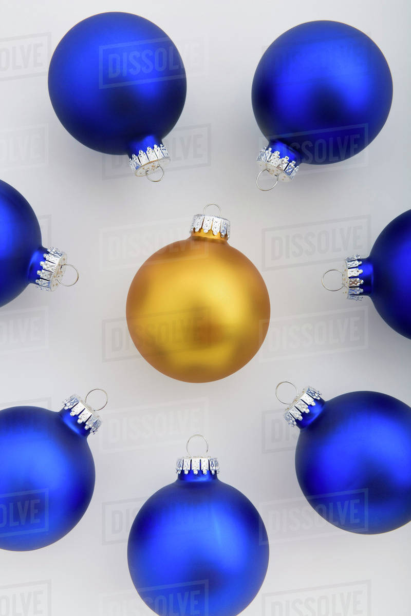 group of blue christmas tree balls placed in circle with gold ball in the middle studio portrait - Blue Christmas Tree Ornaments group of blue christmas tree balls placed in circle with gold ball in the middle studio portrait - Blue Christmas Tree Ornaments