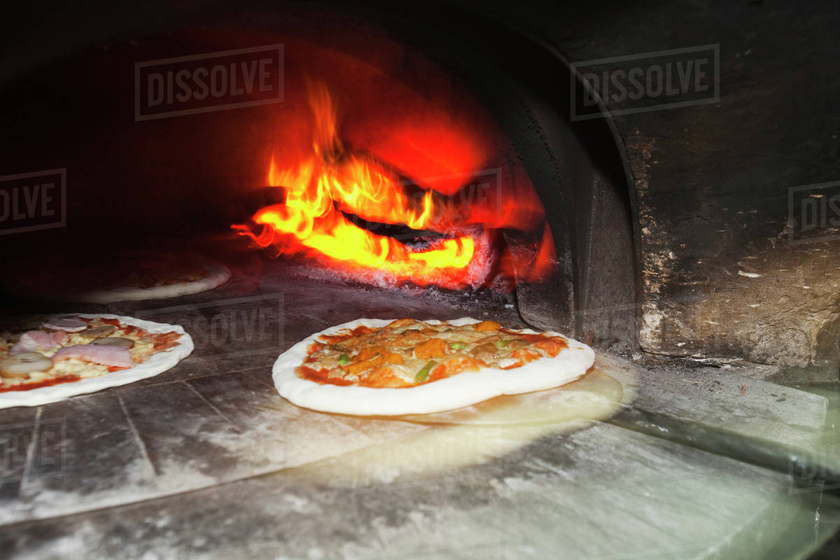 WoodFired Oven With Traditional Italian Pizzas Ready To Be Baked; Coolangatta, Queensland