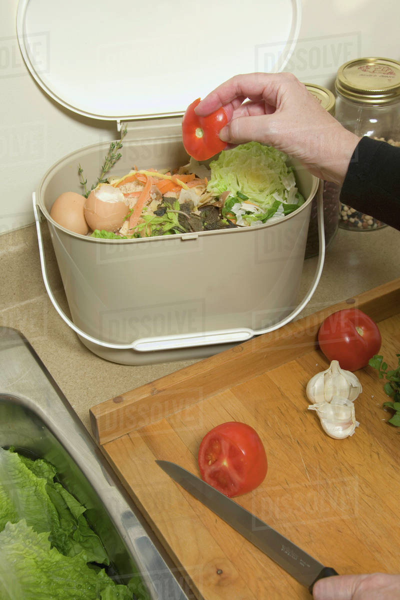 Organic Recycling, Kitchen Compost Pail Stock Photo Dissolve