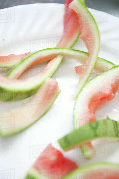 Watermelon Rinds On Paper Plate - Stock Photo - Dissolve