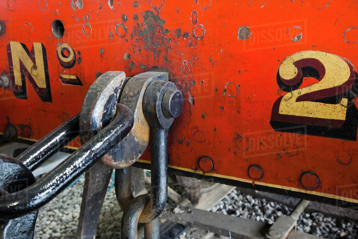 Weathered Markings On The Side Of A Red Train Car; Shildon, Durham