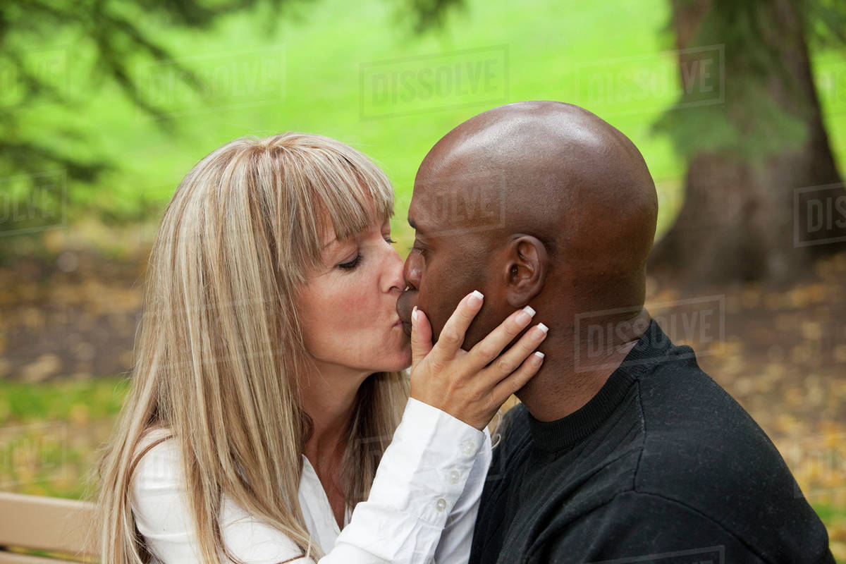 Interracial Couple  Kissing In A Park Edmonton Alberta 