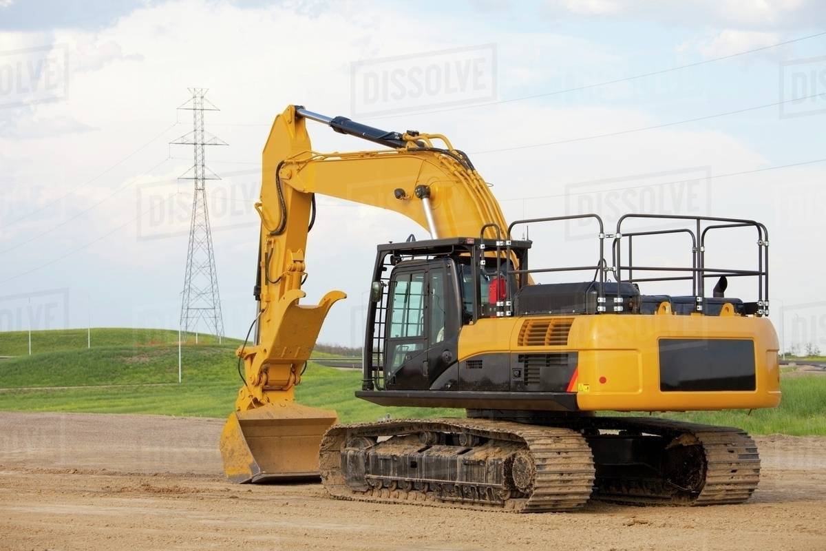 Road Construction Using A Backhoe; Edmonton, Alberta, Canada Stock