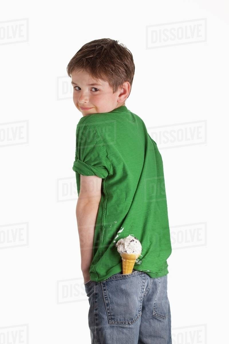A Boy With An Ice Cream Cone In His Back Pocket; Three Hills, Alberta