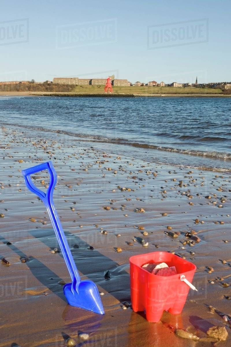 Bucket And Shovel On Beach Stock Photo Dissolve